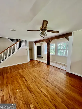 a view of an empty room and window
