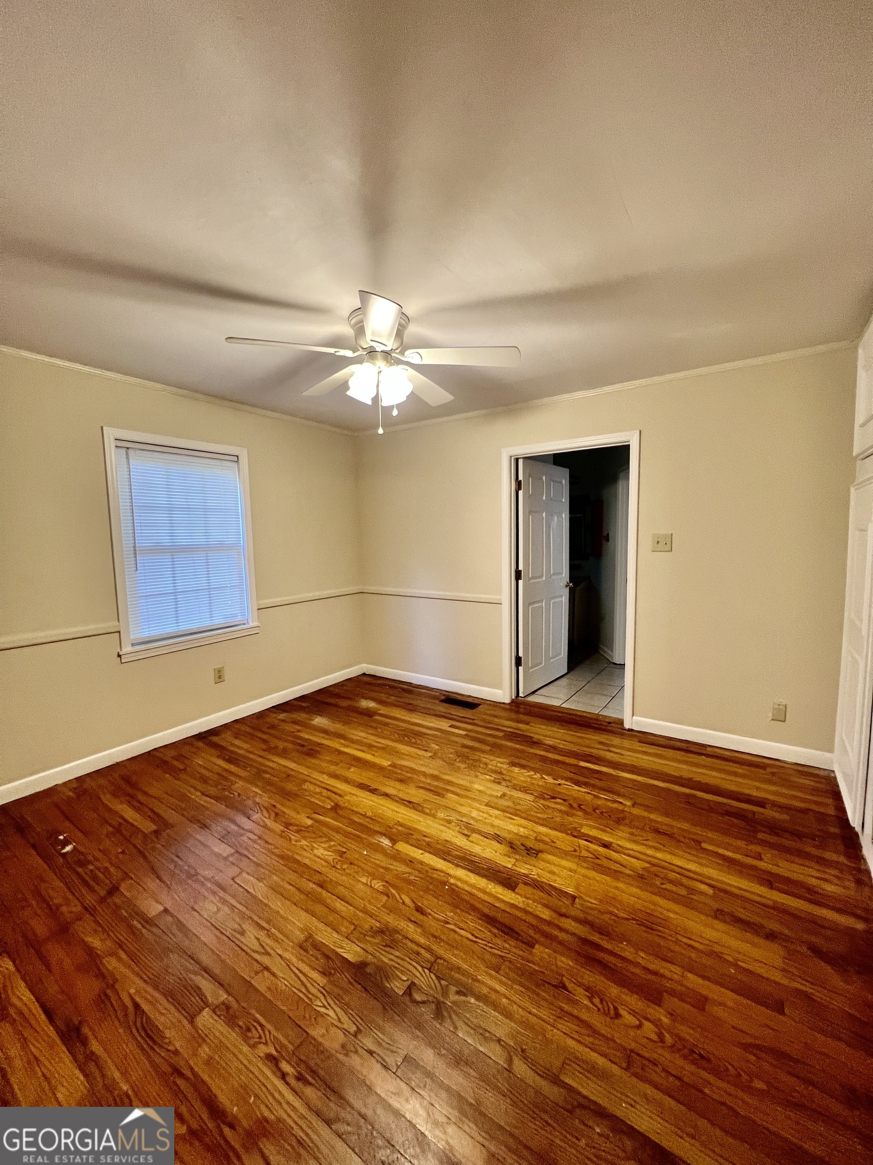 112 Cherry Lane Athens, GA 30601 - Photo 6 of 11 a view of empty room with wooden floor