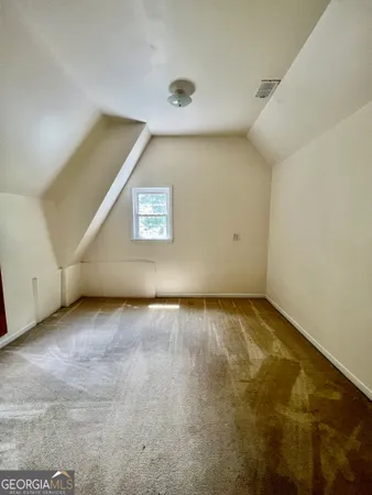 an empty room with a workbench