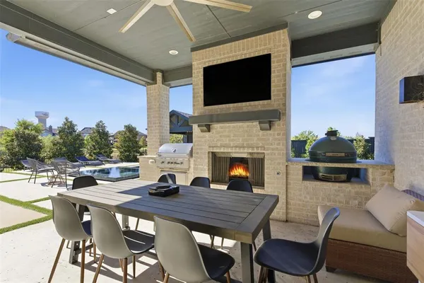 a view of a dining room with furniture window and fire place