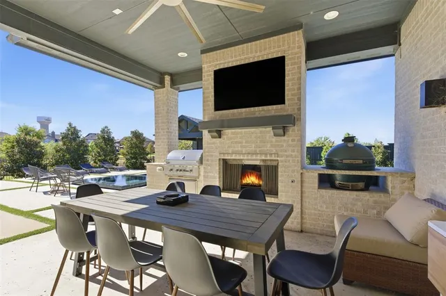 a view of a dining room with furniture window and fire place