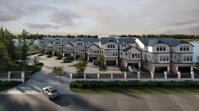 an aerial view of a house with swimming pool and outdoor seating