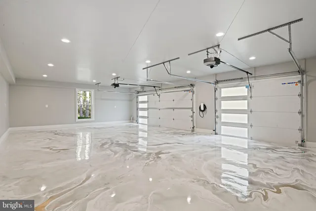 a view of a house with a yard and wooden deck