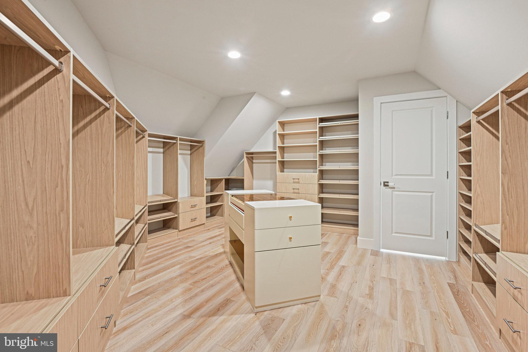 10900 Hunter Station Road Vienna, VA 22181 - Photo 70 of 110 a room with furniture and a flat screen tv