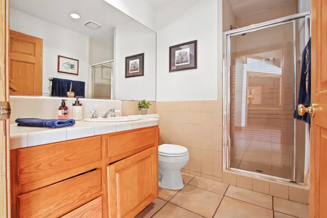 a bed room with a bed and wooden floor