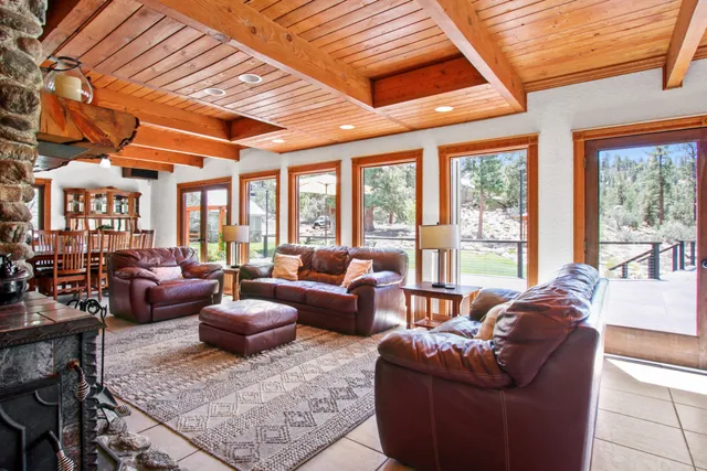 a view of a chairs and table in a patio