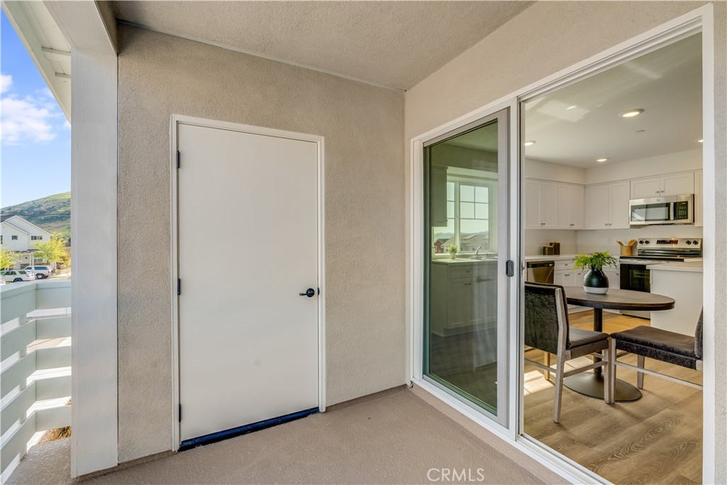 3802 Ranch House Road, Unit 303 San Luis Obispo, CA 93401 - Photo 20 of 35 Balcony with Storage Closet