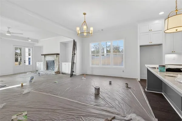 a close view of a sink and cabinets