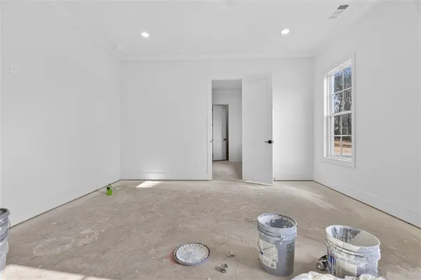 a view of a hallway with a room