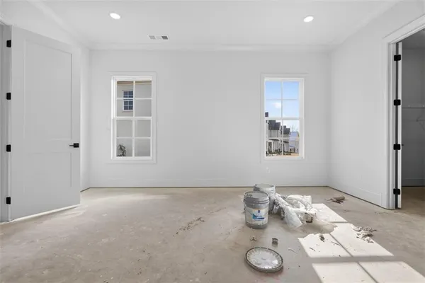 an empty room with windows