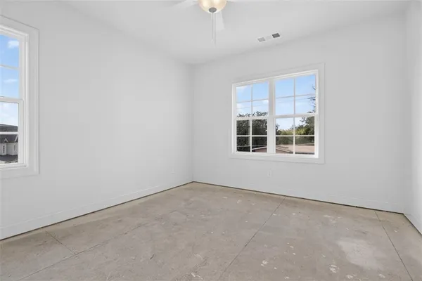 an empty room with windows