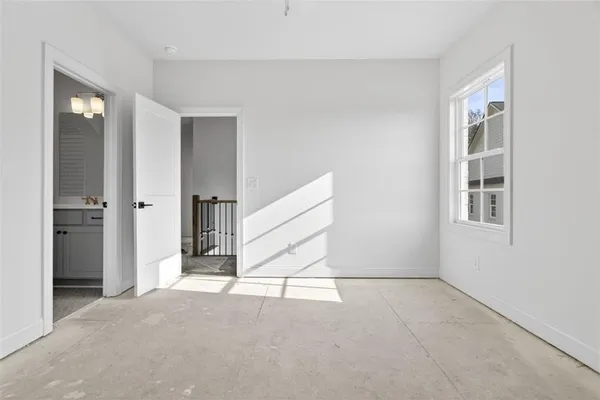a bathroom with a double vanity sink toilet and shower
