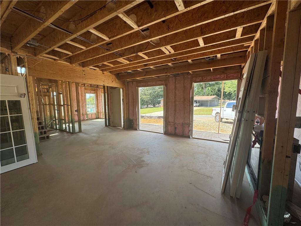212 Suwanee Avenue Northeast Suwanee, GA 30024 - Photo 7 of 14 a view of empty room with windows