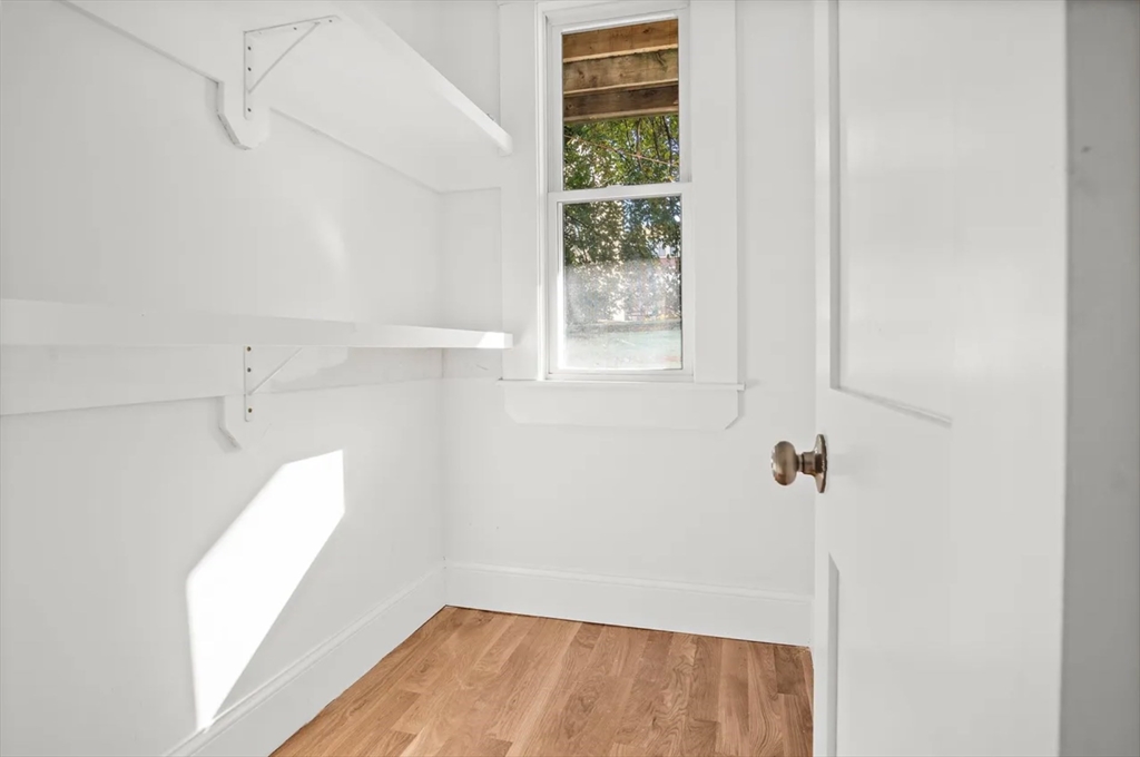 10 Sutton Street Boston, MA 02126 - Photo 23 of 24 a view of small space with wooden floor and a window