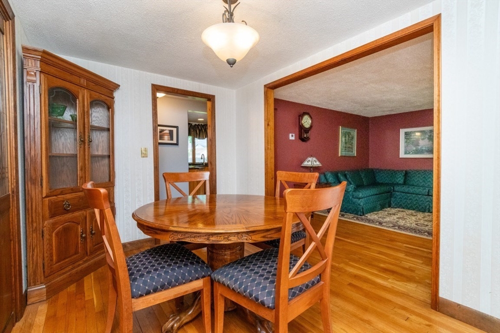 118 Bruce Road Walpole, MA 02081 - Photo 8 of 30 a dining room with furniture and wooden floor