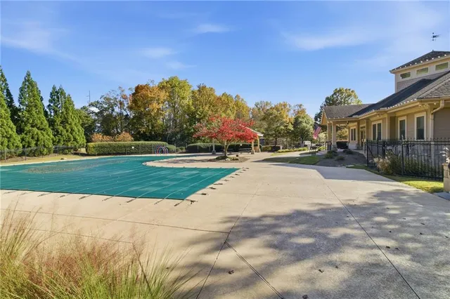 a view of a house with a big yard