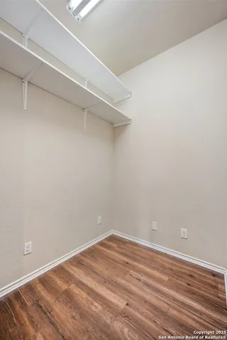 a bathroom with a sink a vanity and a mirror