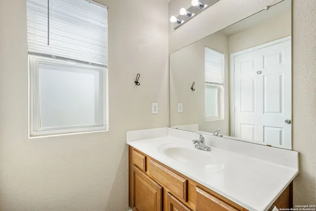 a bathroom with a white bath tub