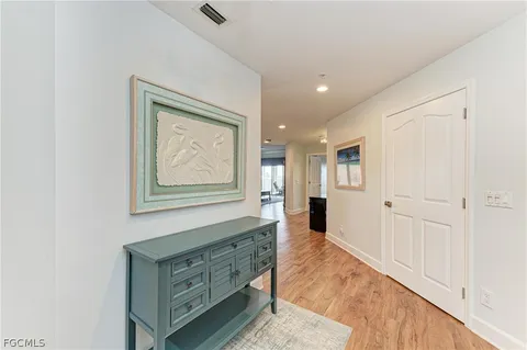 a view of a hallway with front door