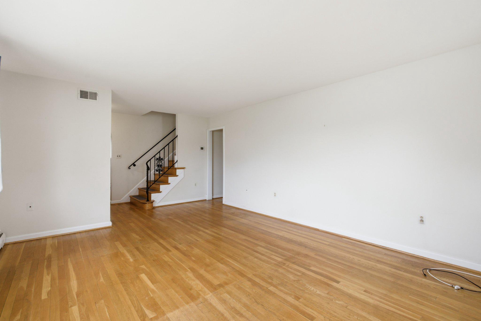 1110 Chillum Manor Road Hyattsville, MD 20783 - Photo 5 of 30 Living room with staircase access.