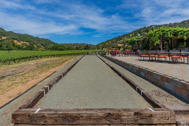 a view of swimming pool with a balcony