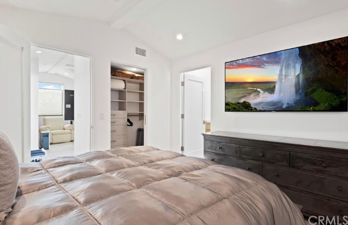 304 Iris Avenue Corona del Mar, CA 92625 - Photo 13 of 19 a bedroom with a bed and a flat screen tv