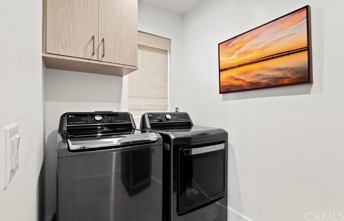 304 Iris Avenue Corona del Mar, CA 92625 - Photo 7 of 19 a close view of a stove and a microwave