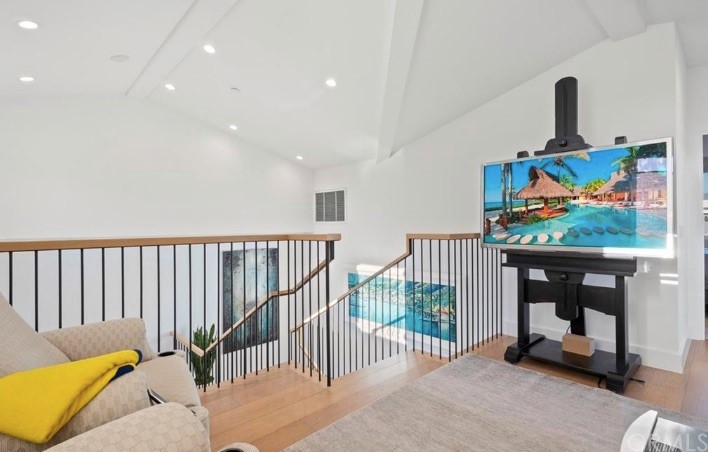 304 Iris Avenue Corona del Mar, CA 92625 - Photo 9 of 19 a living room with furniture and a flat screen tv