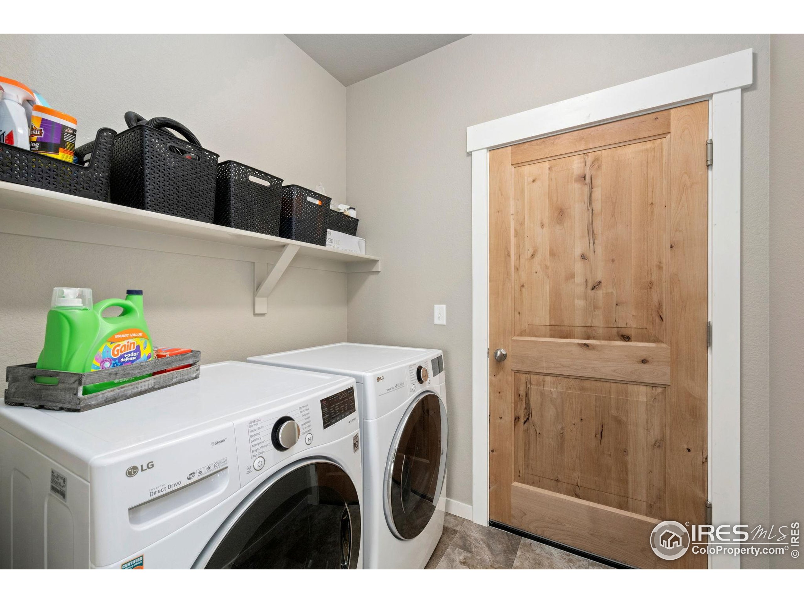 3812 Beech Tree Street Wellington, CO 80549 - Photo 15 of 17 a utility room with dryer and washer