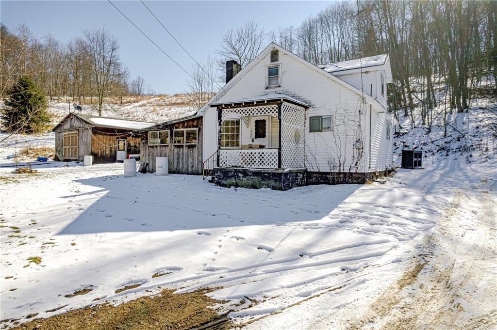 1249 Ridge Road Templeton, PA 16259 - Photo 11 of 37 a front view of a house with a yard