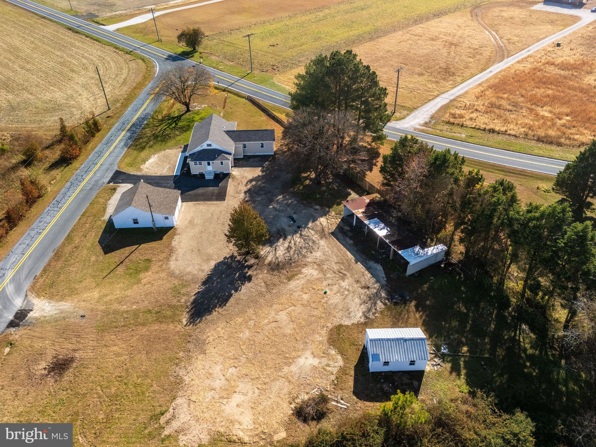 24532 Deep Branch Road Georgetown, DE 19947 - Photo 16 of 43 a view of a house with a park