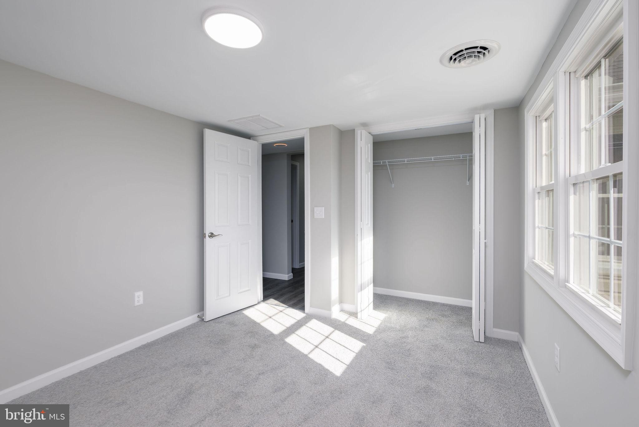 24532 Deep Branch Road Georgetown, DE 19947 - Photo 33 of 43 a view of an empty room with a window