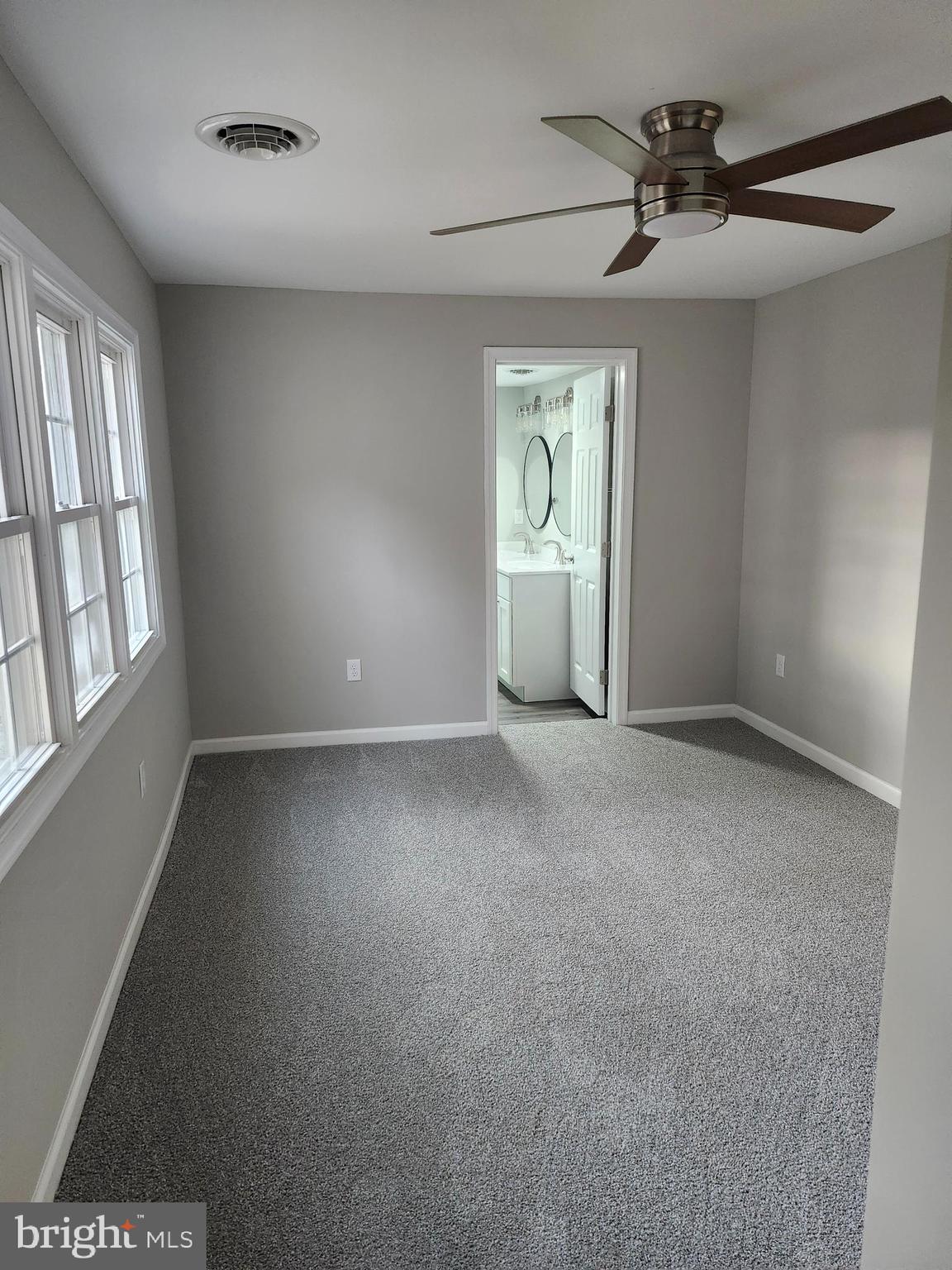 24532 Deep Branch Road Georgetown, DE 19947 - Photo 6 of 43 a view of a room that has window in it