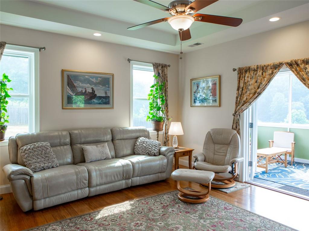 708 Sheep Pasture Road Commerce, GA 30529 - Photo 18 of 35 a living room with furniture and a large window