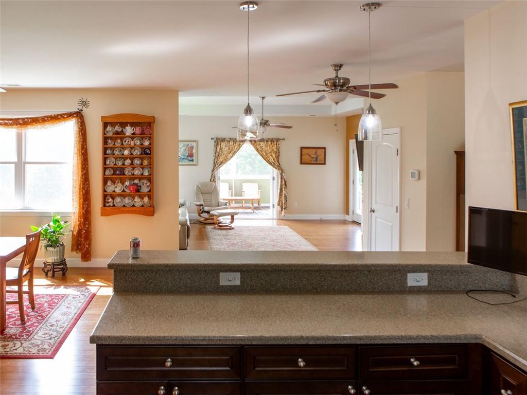 708 Sheep Pasture Road Commerce, GA 30529 - Photo 29 of 35 a living room with granite countertop furniture and a flat screen tv
