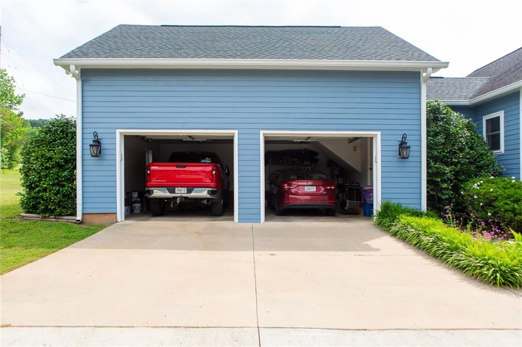 708 Sheep Pasture Road Commerce, GA 30529 - Photo 3 of 35 a view of a house with a car parked in front of a house