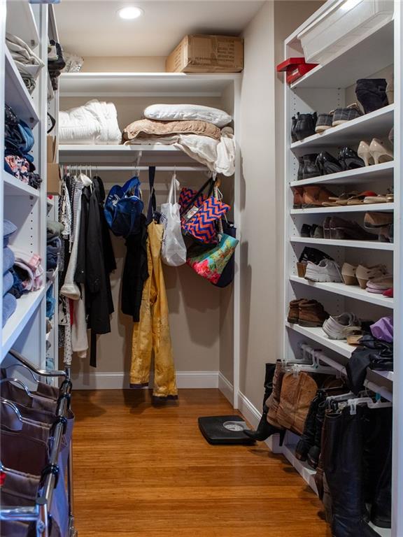 708 Sheep Pasture Road Commerce, GA 30529 - Photo 34 of 35 a view of walk in closet with clothes and shoes