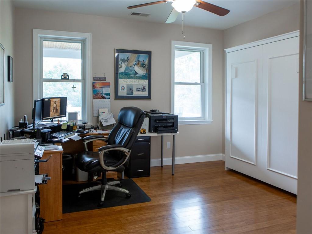 708 Sheep Pasture Road Commerce, GA 30529 - Photo 35 of 35 a view of a workspace with furniture and a window