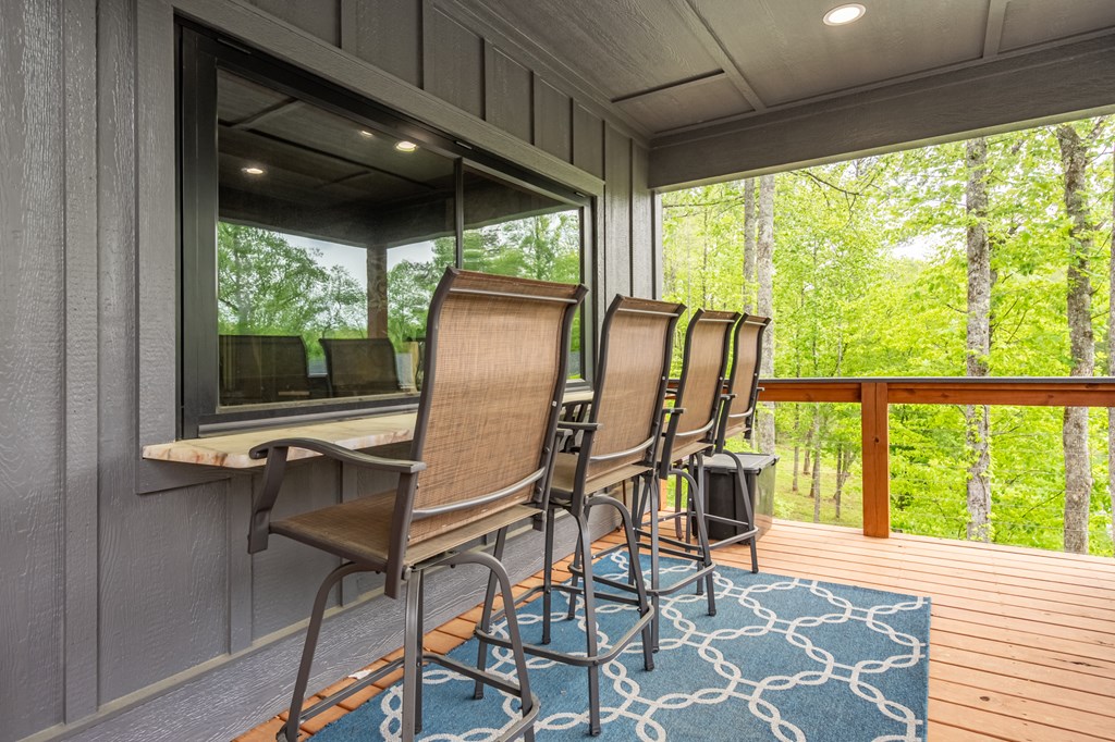 1220 Sunset Road Epworth, GA 30541 - Photo 22 of 46 a dining room with furniture and windows