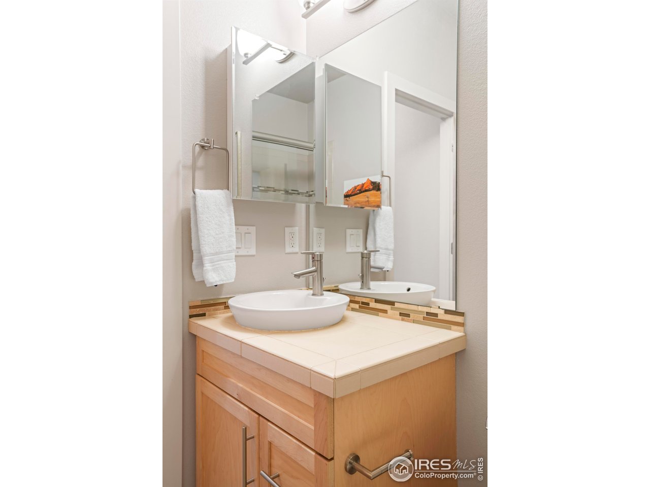 4190 Longview Lane Boulder, CO 80301 - Photo 14 of 29 a bathroom with a sink and a mirror
