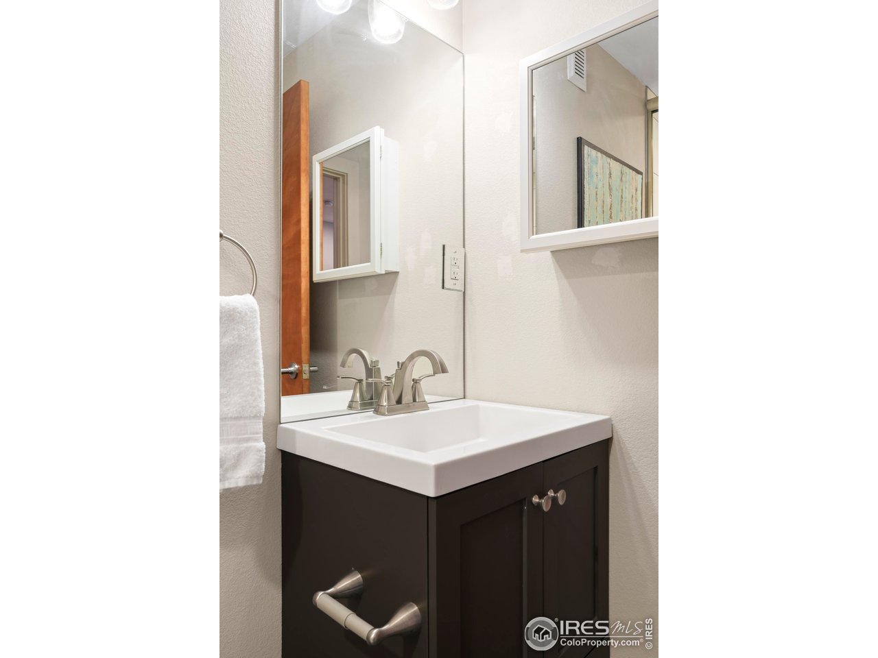4190 Longview Lane Boulder, CO 80301 - Photo 23 of 29 a bathroom with a sink and a mirror