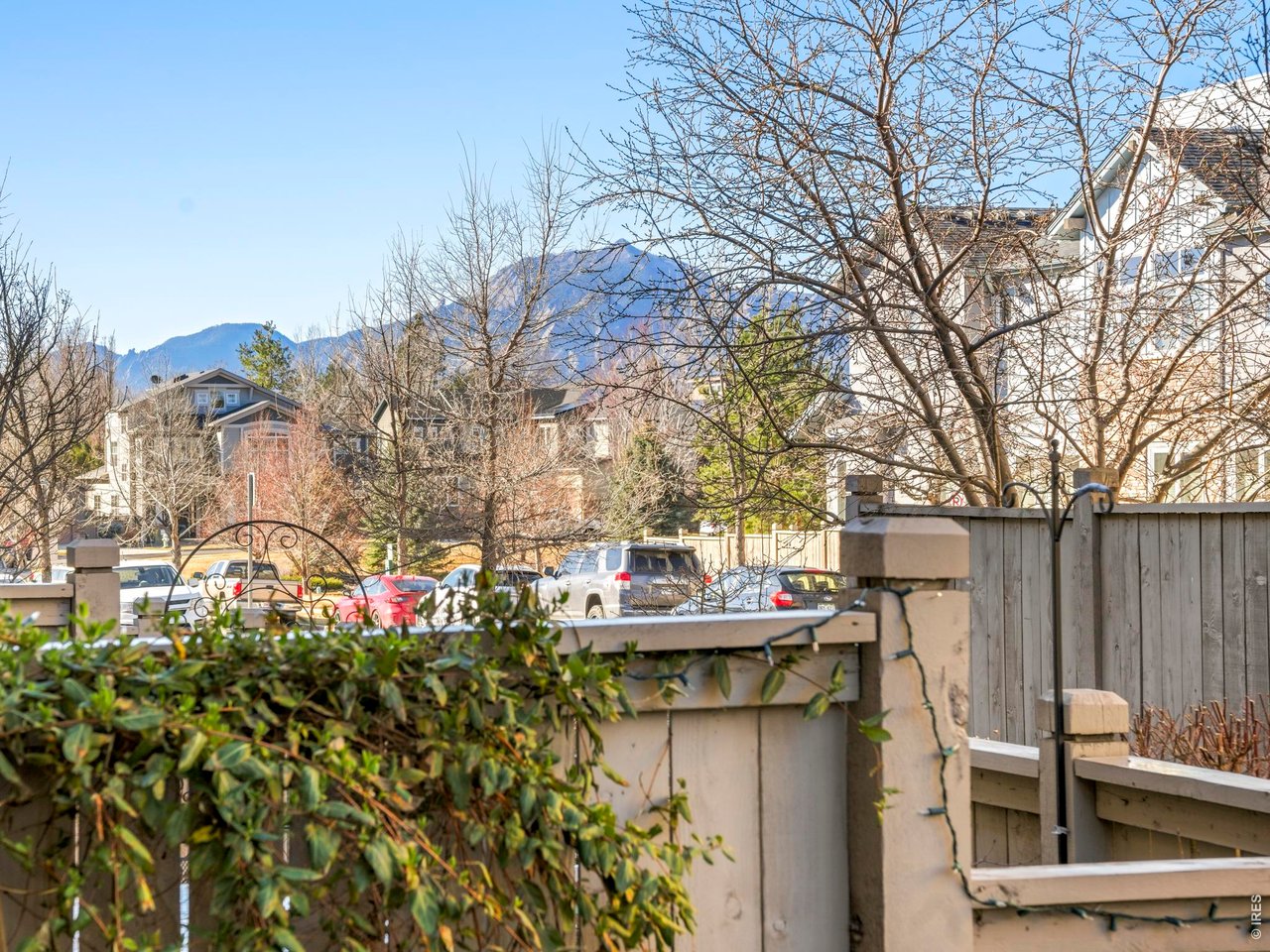 4190 Longview Lane Boulder, CO 80301 - Photo 27 of 29 a view of a house with large trees and playing area