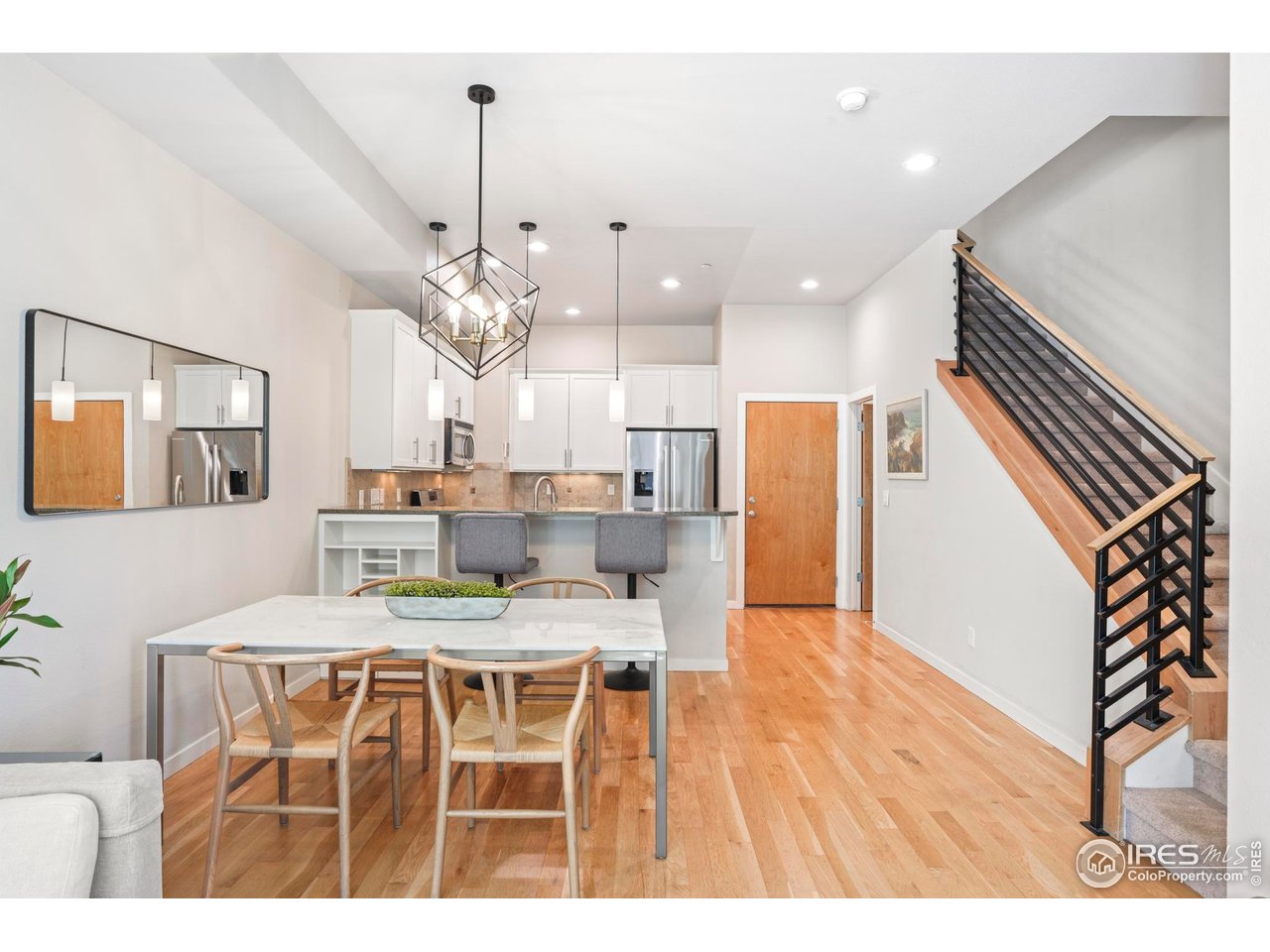 4190 Longview Lane Boulder, CO 80301 - Photo 4 of 29 a view of a dining room with furniture and wooden floor