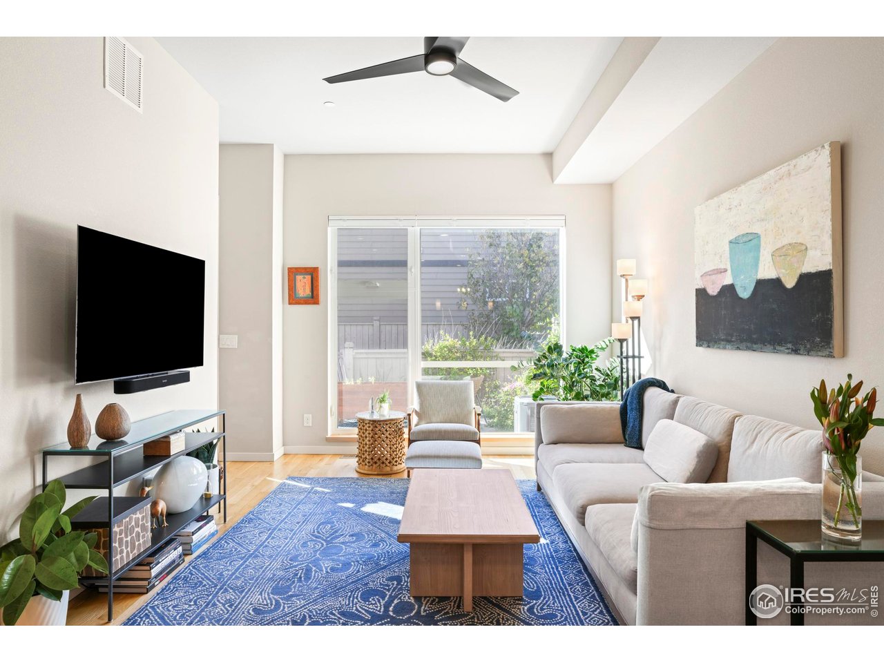 4190 Longview Lane Boulder, CO 80301 - Photo 5 of 29 a living room with furniture and a flat screen tv