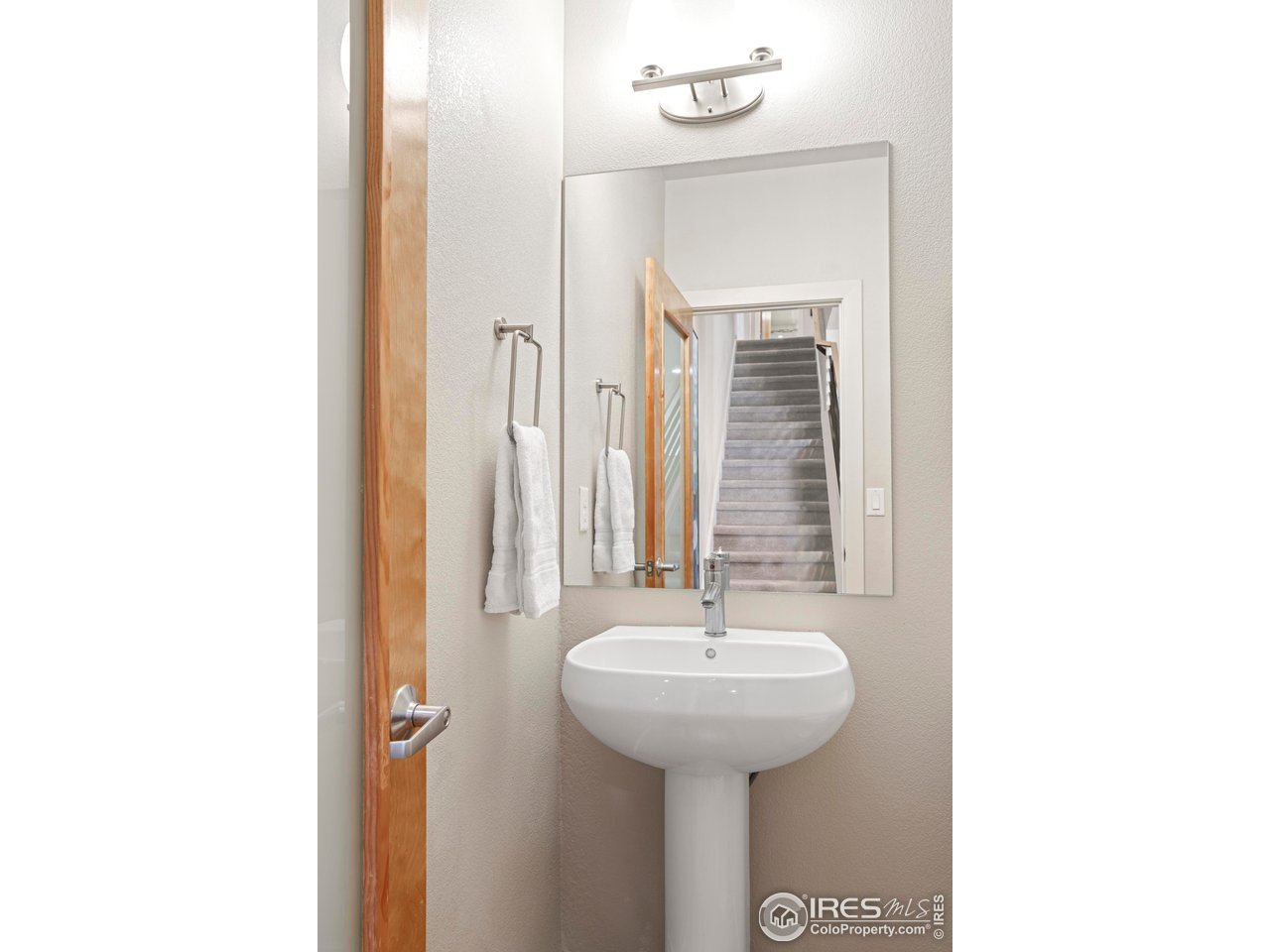 4190 Longview Lane Boulder, CO 80301 - Photo 10 of 29 a bathroom with a sink and a mirror