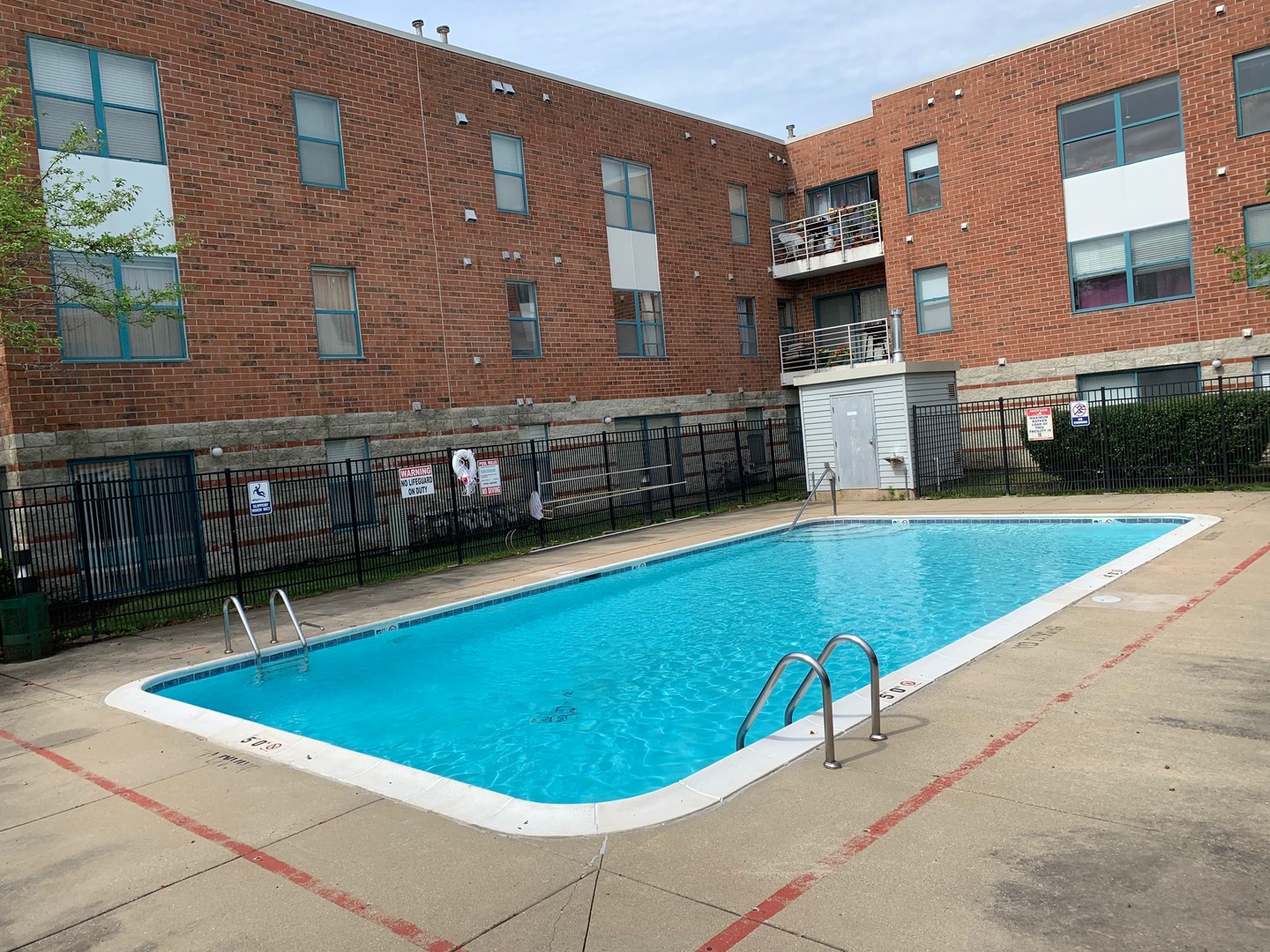 3265 Kirchoff Road, Unit 121 Rolling Meadows, IL 60008 - Photo 13 of 14 a view of a swimming pool with a chair