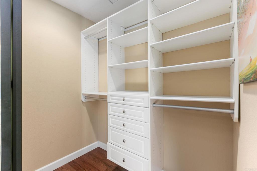 1521 Flair Encinitas Drive Encinitas, CA 92024 - Photo 20 of 45 a view of walk in closet with empty racks
