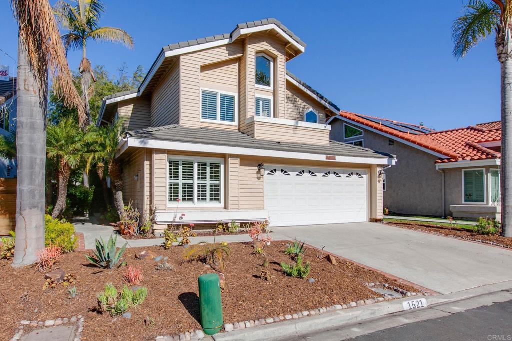 1521 Flair Encinitas Drive Encinitas, CA 92024 - Photo 2 of 45 a front view of a house with garden