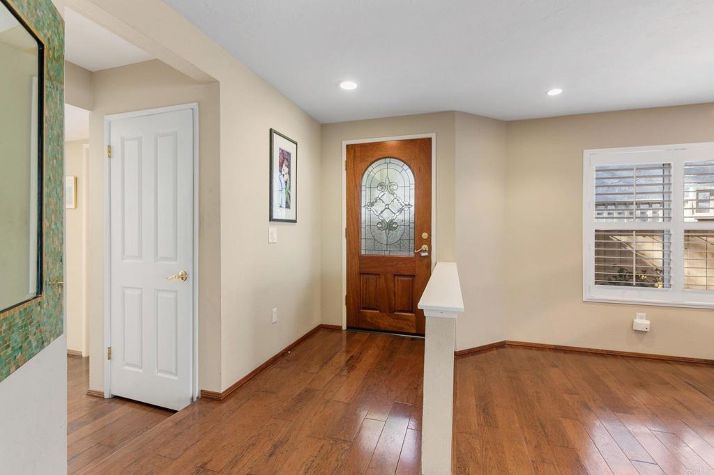 1521 Flair Encinitas Drive Encinitas, CA 92024 - Photo 6 of 45 a view of livingroom with hardwood floor and hallway