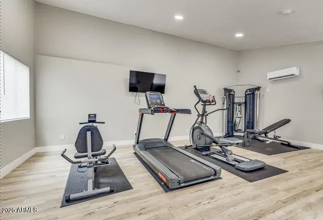 a view of a room with gym equipment